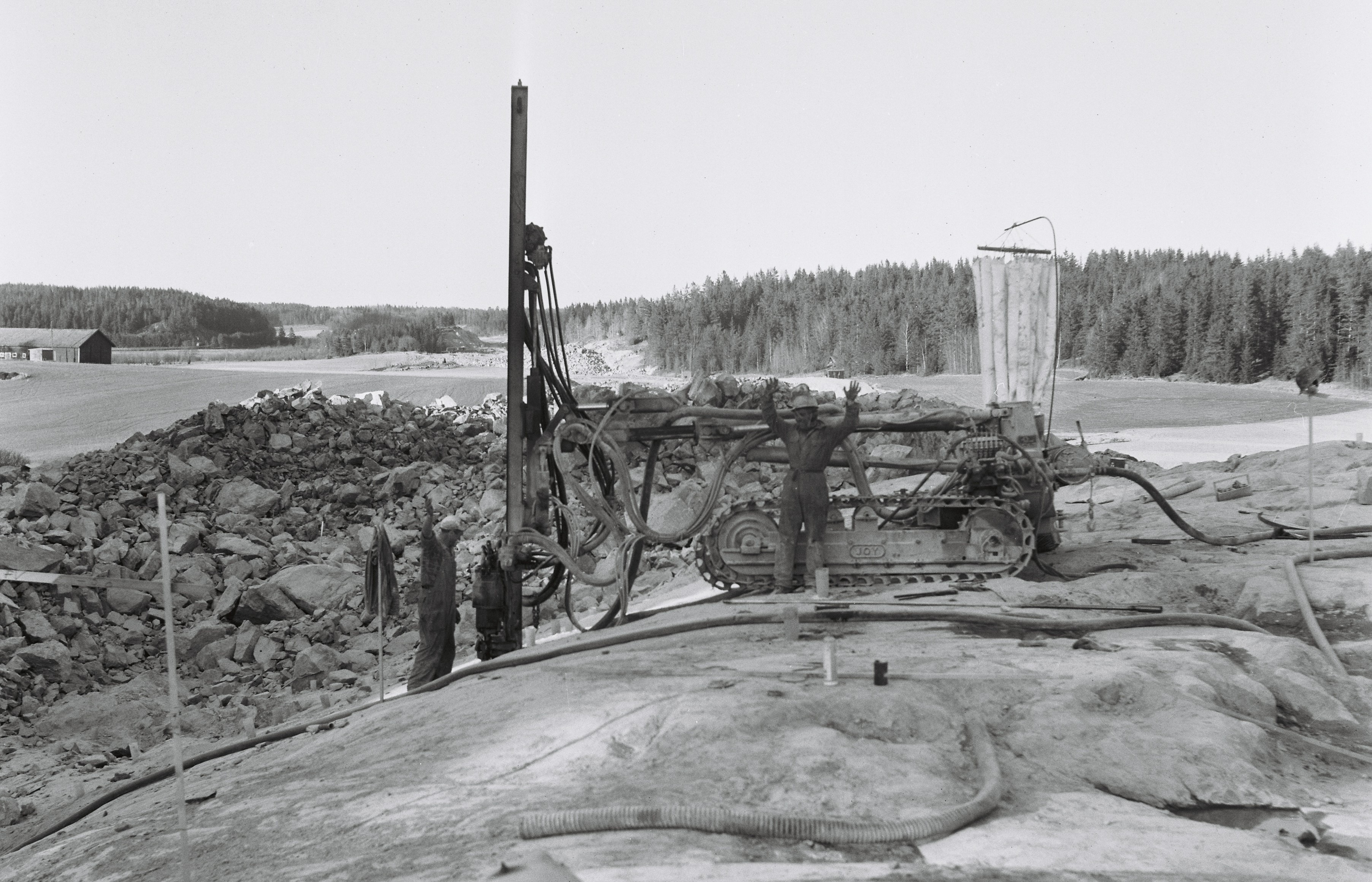 A happy drilling crew using one of the first ILMEG Dust Collectors 1971.